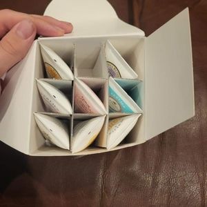 Various Hans lotions.  One of 9 missing. Pocket book size.